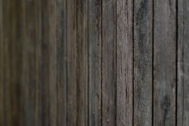 Close up old wooden fence panels. dark tone - Photo, Image