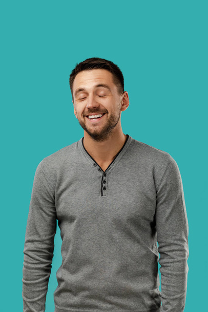 smiling handsome bearded man on white background - Foto, Imagen