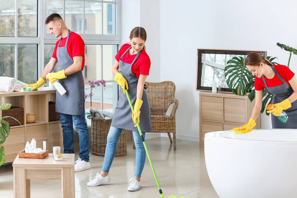 Team of janitors cleaning bathroom - Fotografie, Obrázek