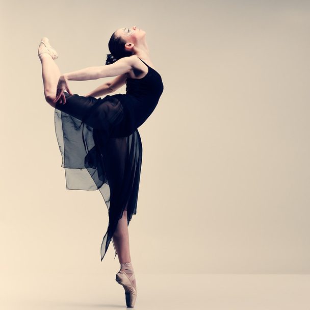 Beautiful ballet-dancer, modern style dancer posing on studio background - Fotoğraf, Görsel