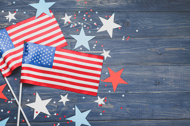 USA flags and stars on wooden background. Memorial Day celebration - Zdjęcie, obraz