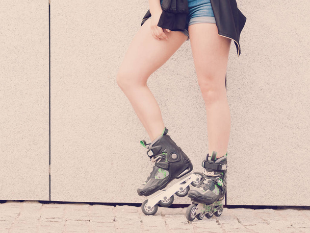 Sexy woman wearing roller skates - Photo, Image