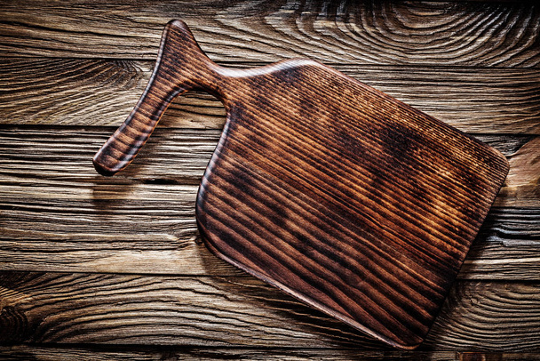 vintage wooden cutting or serving board - Foto, afbeelding