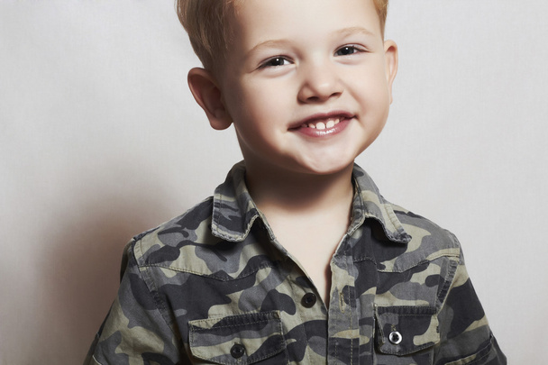 Smiling child. funny little boy. close-up. joy. 4 eyers old. military shirt - Photo, Image