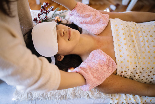 SPA therapist scurb girl chest with pink gloves - Photo, Image