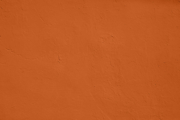飽和オレンジ色低コントラストコンクリートテクスチャバックグルー - 写真・画像
