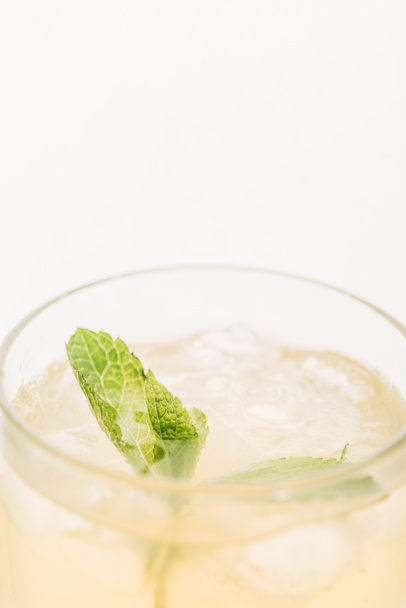 close up view of fresh lemonade with mint leaves isolated on white - Valokuva, kuva