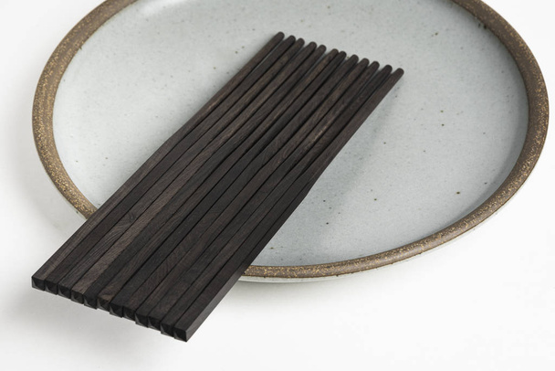 Six Pairs Of Chopsticks On Stoneware Plate - Photo, Image