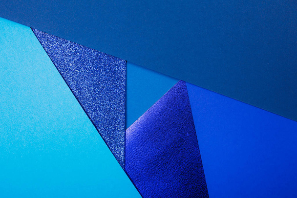 Divided in several parts blue paper background - Photo, image