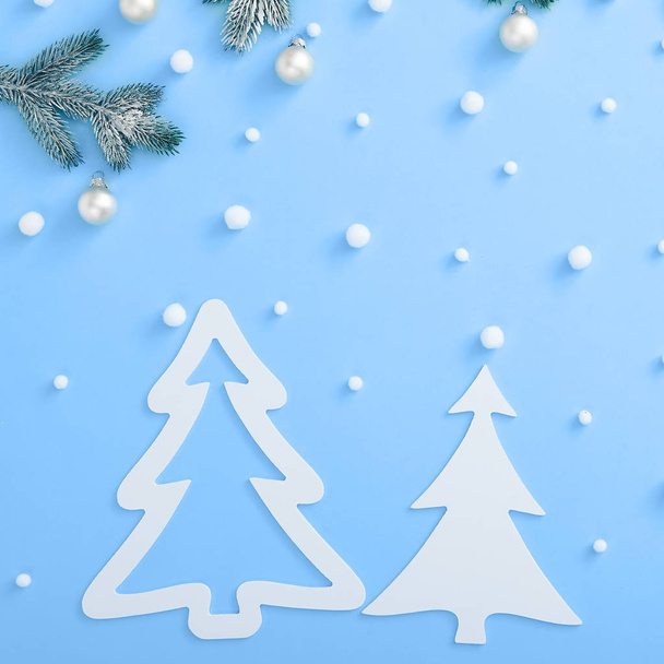 Christmas composition with snowy fir branch - Φωτογραφία, εικόνα
