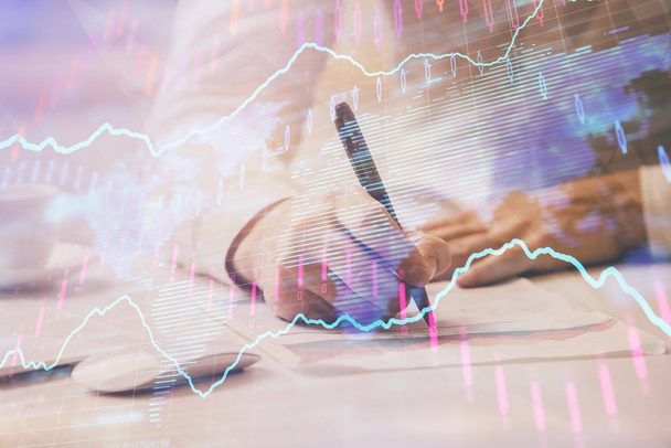 Financial trading chart multi exposure with man desktop background. - Valokuva, kuva