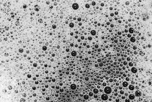 Abstrakti tausta ja rakenne valkoisia ja mustia kuplia valon valaistus
 - Valokuva, kuva
