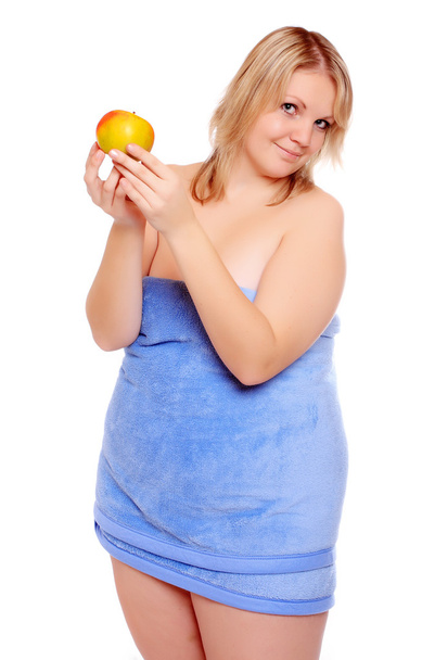 Bild einer übergewichtigen Frau mit frischem reifen Apfel. - Foto, Bild