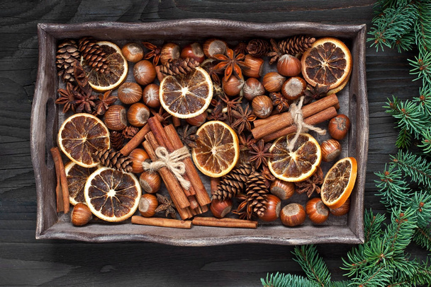 Christmas composition with spices on wooden background - Fotoğraf, Görsel