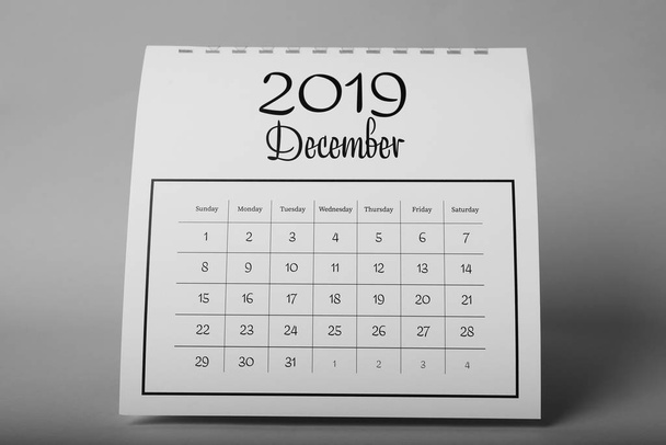 Paper calendar on grey background. Planning concept - Zdjęcie, obraz