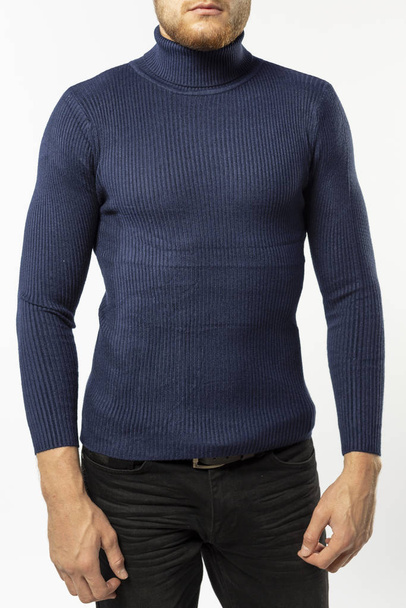 man in blue turtleneck with long sleeves on white background, mock-up, copy space - Foto, Imagen