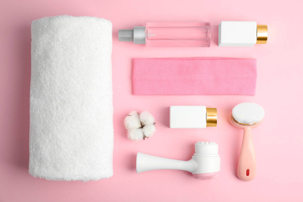 Flat lay composition with face cleansing brushes on pink backgro - Photo, Image