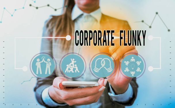 手書きのテキスト書き込み｜Corporate Flunkyコンセプトとは、会社で別のデモンストレーションのために素直に働く人を意味します。. - 写真・画像