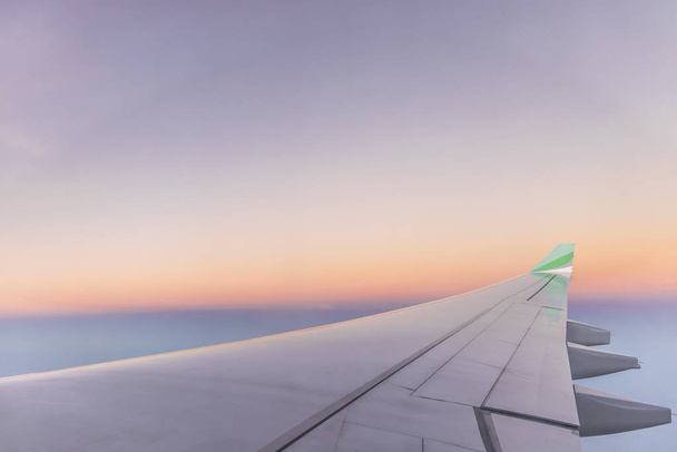 Sunrise view from airplane window at high altitude about Africa. - 写真・画像