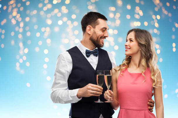 happy couple with champagne glasses toasting - Foto, Imagen