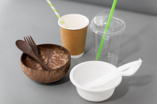 close up of eco friendly and plastic tableware - Фото, зображення