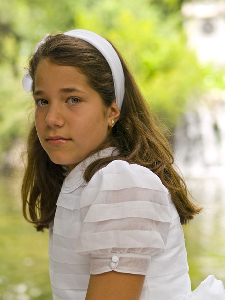Girl posing with her first communion dress - Φωτογραφία, εικόνα