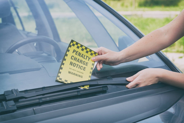 Parking ticket under windshield wiper - Photo, Image