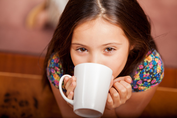 Little girl with a cup - 写真・画像