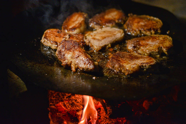 Cutlets pan fried in the fire. pan is also cooking meat - Photo, Image