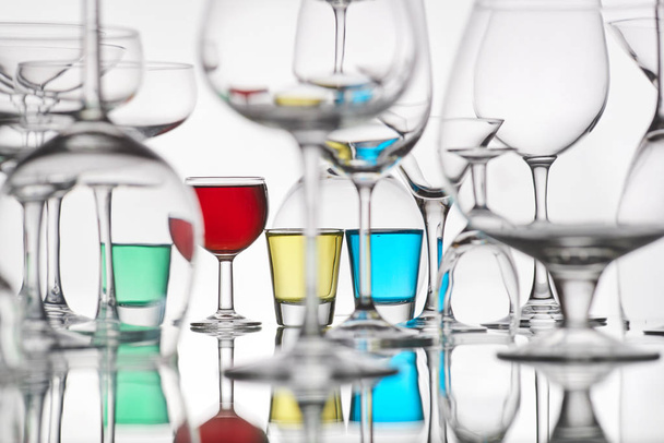 glasses with colorful drinks on a white background - Foto, immagini
