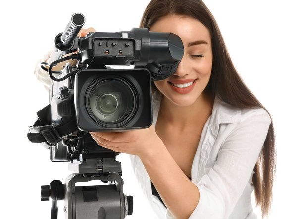 Operator with professional video camera on white background - Foto, Imagem