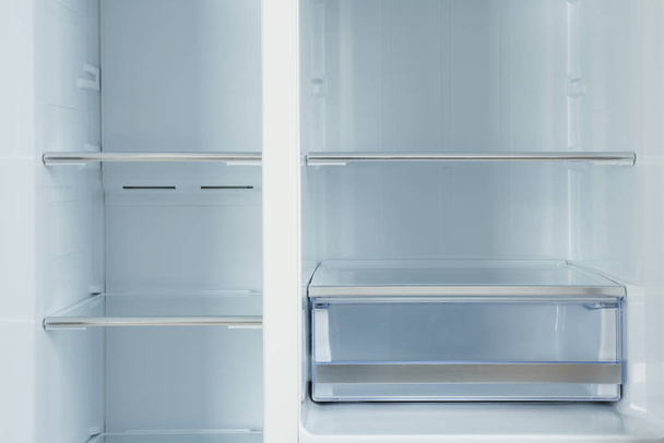 Shelves of empty modern refrigerator, closeup view - Foto, immagini