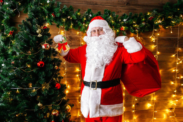 Santa Claus bring the sack with gifts for Christmas. - Valokuva, kuva