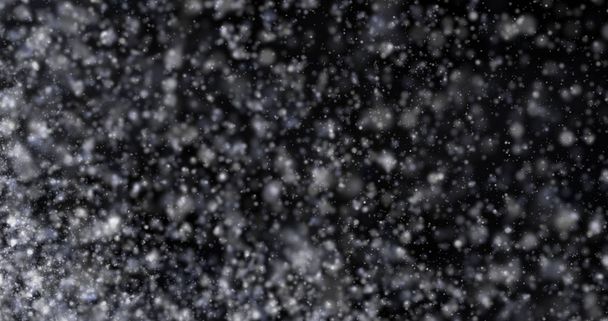 黒を背景にした自然の白い冬の雪 - 写真・画像