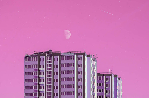 Residential building on a clean colored background, conceptual photo with the moon and stars, texture in Japanese style, pink - Photo, Image