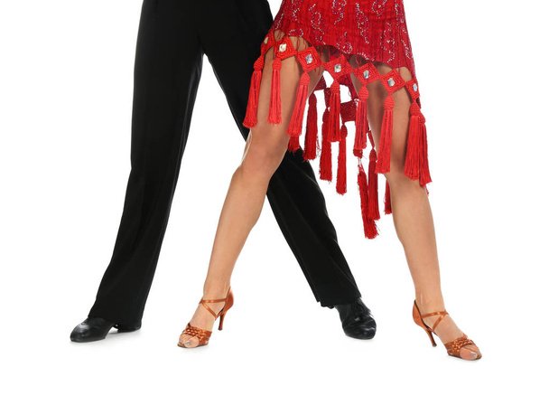 Young couple dancing on white background, closeup of legs - Zdjęcie, obraz
