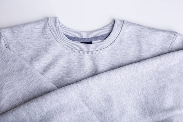 Concept colorful warm blank sweatshirts closeup - Photo, image