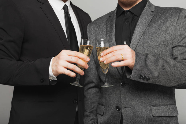 Two men in suits at the LGBTQ wedding - Photo, image