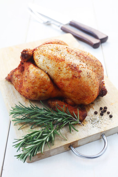 Whole Roasted Chicken On A Wooden Board - Photo, image