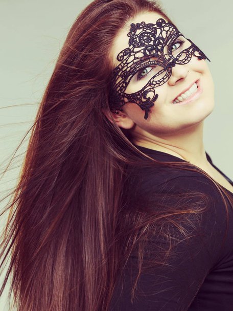 Mysterious woman wearing lace mask - Фото, зображення