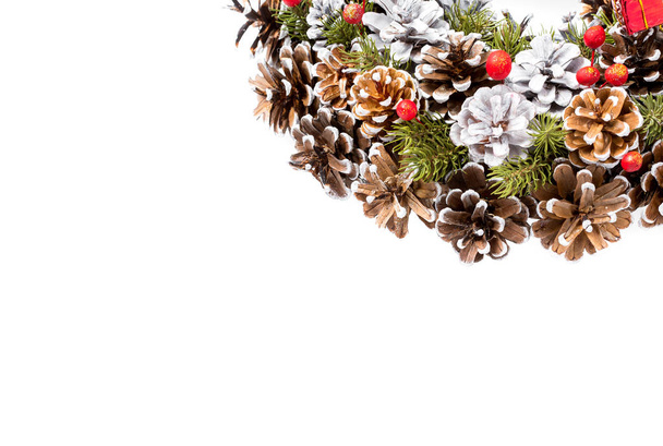 Christmas card mockup with free space for text and new year decor from pine branch needles and cones. - Photo, Image