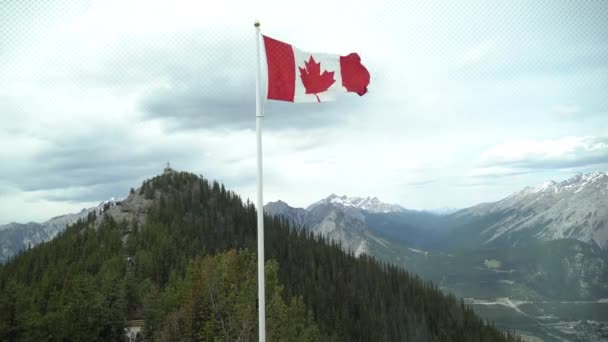 Canadian Flag flying on Sulphur mountain in front of Boardwalk - Footage, Video