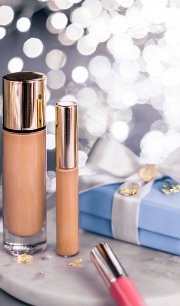 Holiday make-up foundation base, concealer and blue gift box, lu - Photo, Image