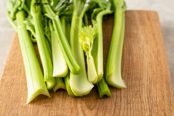 Celery. Leaves and stem of fresh organic green celery close up. Healthy eating, vegetarian food, diet, dieting concept. - Φωτογραφία, εικόνα