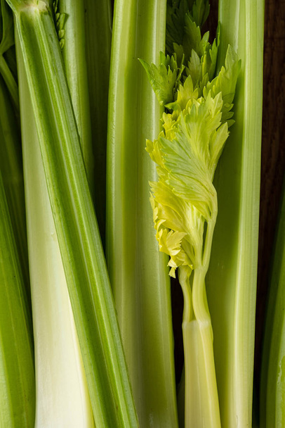 Celery. Leaves and stem of fresh organic green celery close up. Healthy eating, vegetarian food, diet, dieting concept. - Foto, Imagem