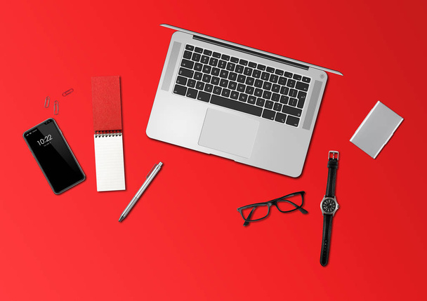 Office desk mockup top view isolated on red - Foto, afbeelding