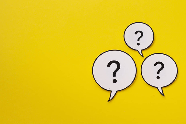 Three speech bubbles with question marks with copy space - Photo, Image