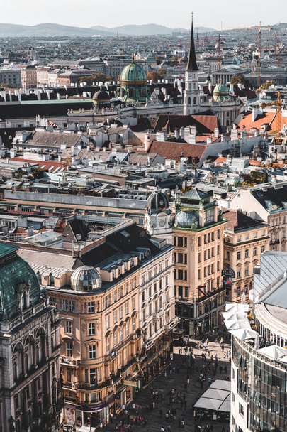 VIENNA, AUSTRIA - OCTOBER, 2019: Rooftop view of Vienna city center with shops and restaurants - Φωτογραφία, εικόνα