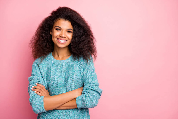 Photo of cheerful positive cute pretty nice woman in blue sweater smiling toothily expressing positive emotions on face with hands folded isolated pastel pink color background - Zdjęcie, obraz