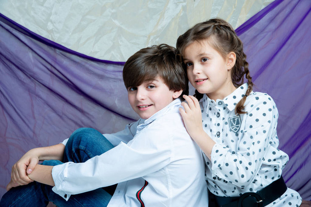 cute portraits of girl and boy in photo studio  - Photo, Image